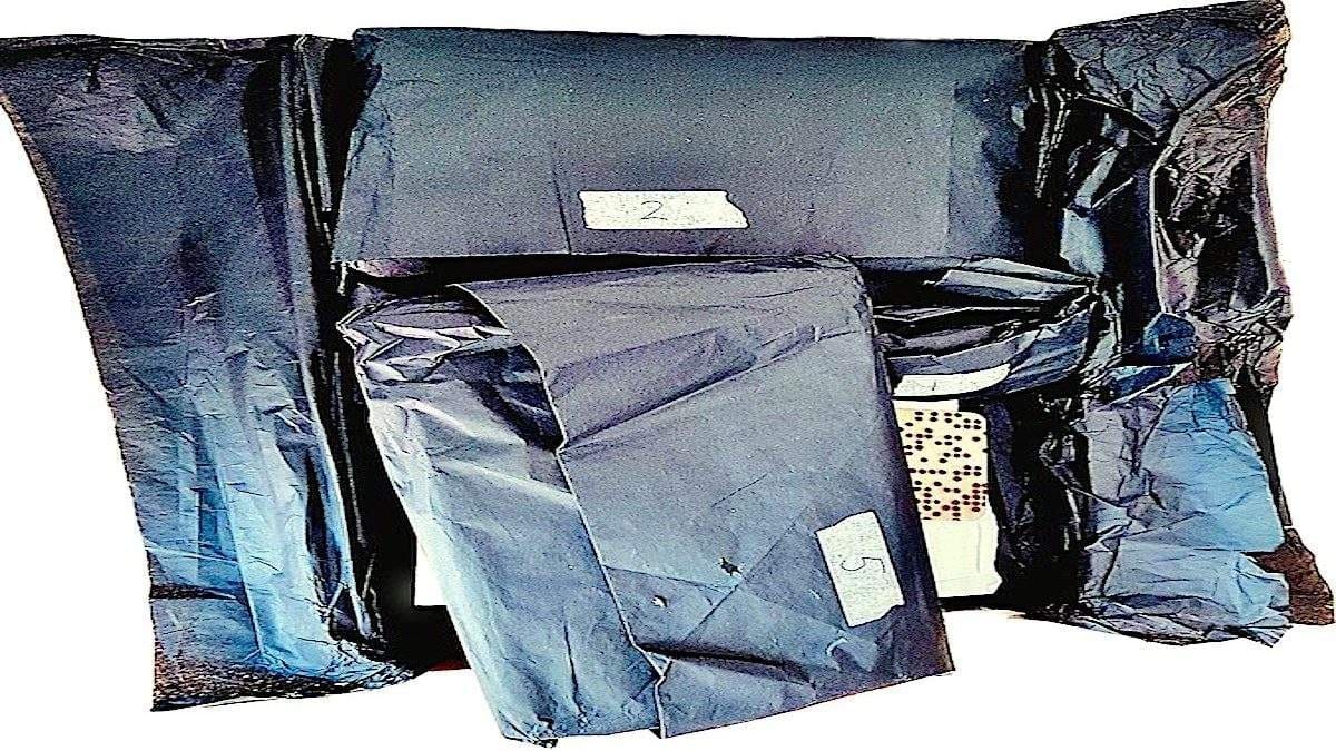 Cardboard box lined with black tissue paper. In which lie various things, stuff and objects, as well as artist-artist's business cards. Also wrapped in black tissue paper, they are waiting for you to unwrap them and continue creating art with them and us, in order to further develop the art of art therapy and keep it up to date.